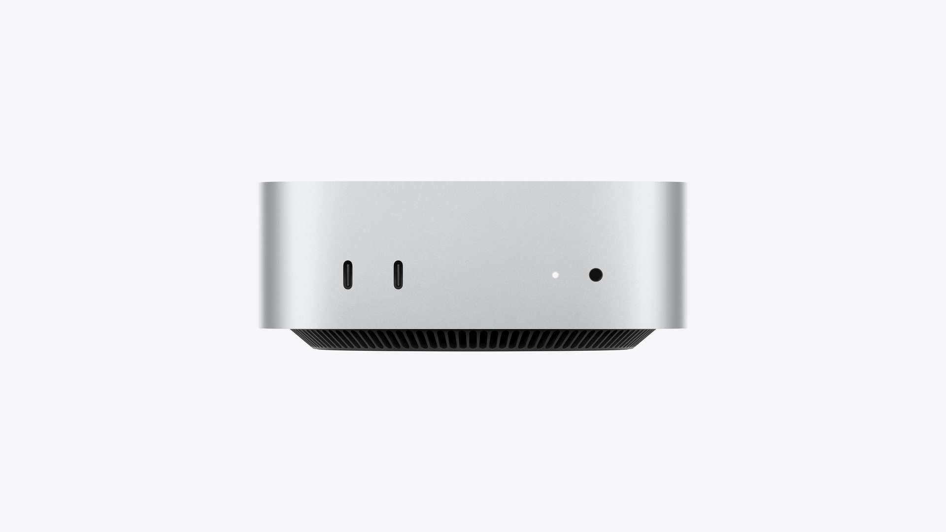 Apple 2026 Mac mini M6 官方產品圖 — 5 x 5 吋超細機身，前置兩個 10 Gb/s USB-C 接口及 3.5mm 耳機孔，M6 12-Core CPU 配 12-Core GPU（Apple 官方圖片）